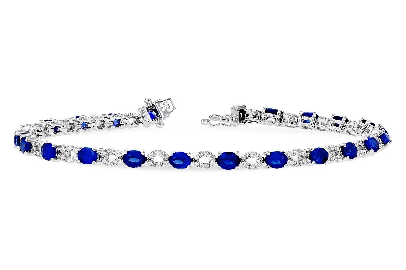 Women’s stackable bangles-14K White Gold 9.70ctw Oval Blue Sapphire & Diamond Tennis Bracelet by Allison Kaufman